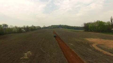 Tractor on the field aerial view Stock Footage 85863157