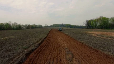 Tractor on the field aerial view Stock Footage 88448595