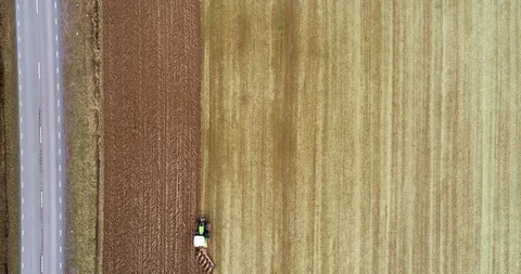 Tractor at the field captured from above 3 動画素材 119945261