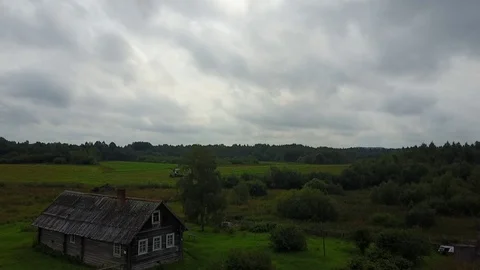 The tractor in the field cuts the grass. Stock Footage 80210752