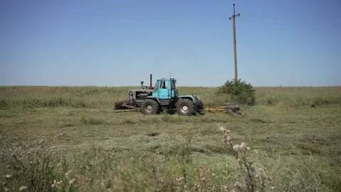 Tractor on field during agricultural work. Field work concept. Stock Footage 278988409