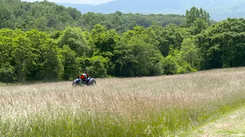 Tractor in a field Stock Footage 52297357