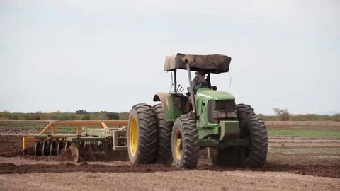Tractor on a field Stock Footage 82589982