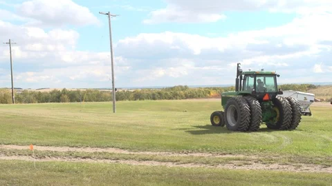 Tractor in a field Stock Footage 106957387