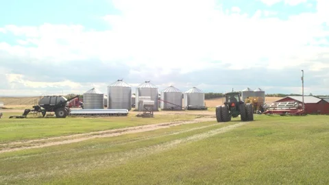 Tractor in a field Stock Footage 106957650