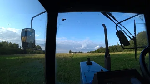 In the tractor in the field Stock Footage 114070141