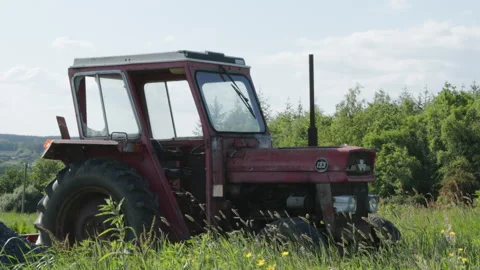 A tractor in a field Stock Footage 244868079