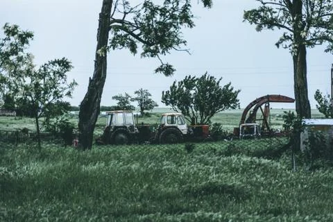 Tractor in the field, moody effect Stock Photos