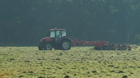 Tractor in field netherlands Stock Footage 125869191
