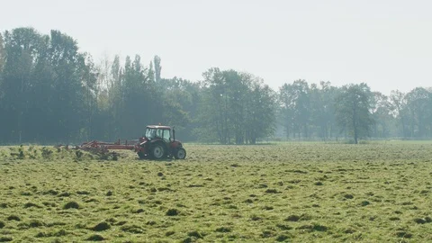 Tractor in field netherlands Stock Footage 125869449