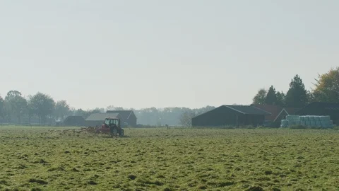 Tractor in field netherlands Stock Footage 125869739