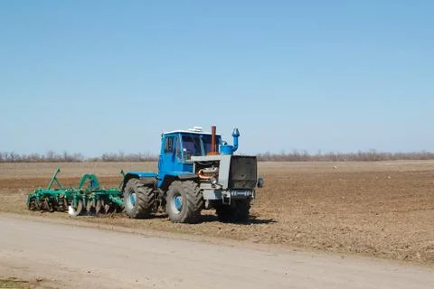 Tractor in field Stock Photos