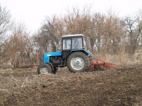 Tractor in a field Stock Photos