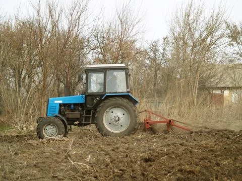 Tractor in a field Stock Photos