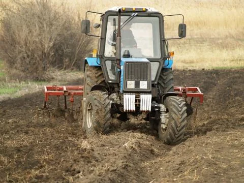 Tractor in a field Stock Photos