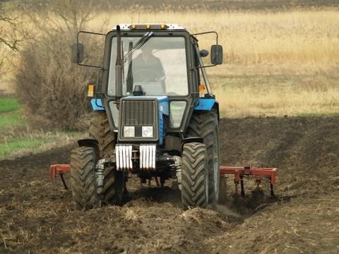 Tractor in a field Stock Photos