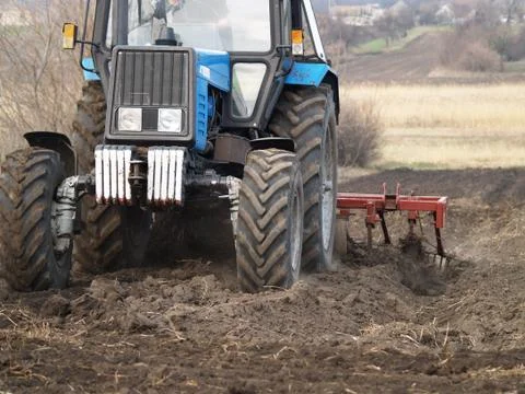 Tractor in a field Stock Photos