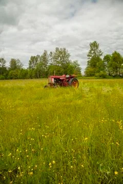 Tractor in field Foto stock