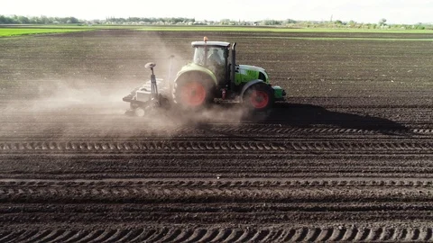 Tractor in the field, sowing corn 스톡 동영상 93303085