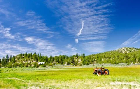 Tractor in a field in utah Stock Photos