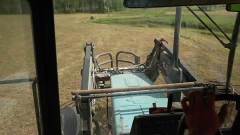 Tractor on the field, view from cabin Stock Footage 249068362
