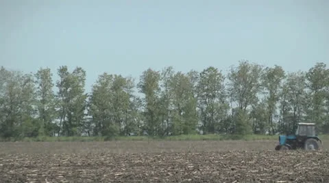 Tractor in the field work the land Stock Footage 23474997