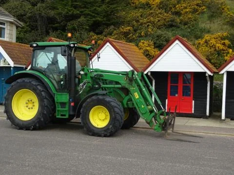 Tractor with Forklift Attachment Stock Photos