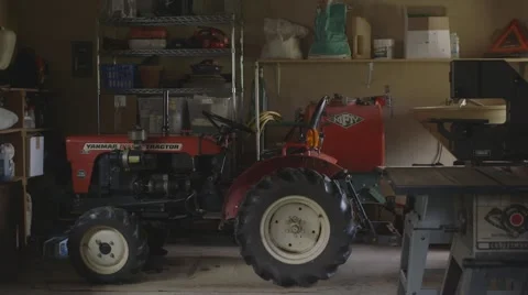 Tractor in garage Stock Footage 44386954