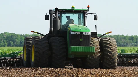 Tractor Giant CU Plowing Stock Footage 33065361