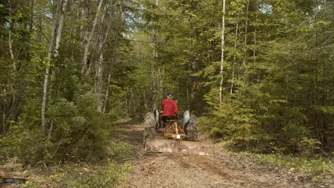 Tractor Grading Dirt Road old equipment 4k Stock Footage 109023464