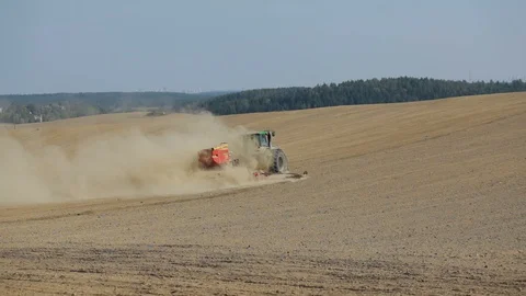Tractor harrow the earth Video stock 123593442