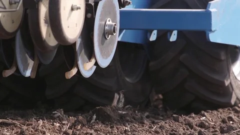 Tractor harrow in operation Stock Footage 83033726
