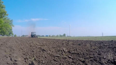 Tractor harrow works the soil after harvest Video stock 54323391