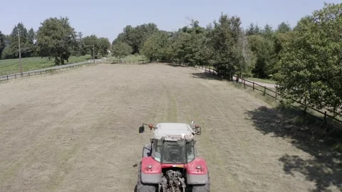 The Tractor With Hay Baler Video stock 164868089