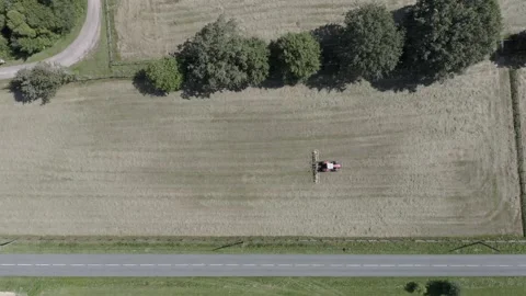The Tractor With Hay Baler Video stock 164868240