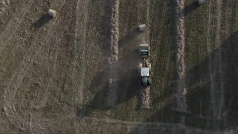 The Tractor With Hay Baler Video stock 164868281
