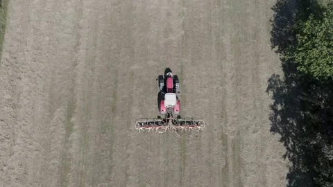 The Tractor With Hay Baler Video stock 164868334