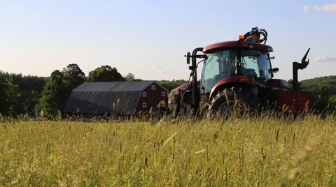 Tractor in a hay field Video stock 39639228