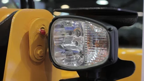 Tractor headlight at the exhibition Stock Footage 90893294