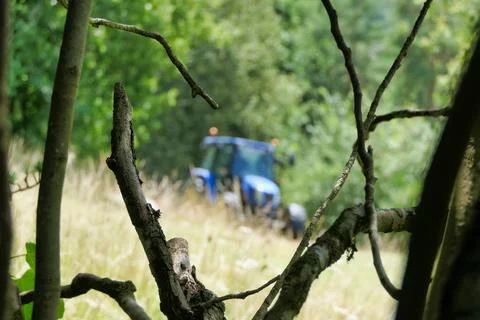 Tractor on the horizon. Stock Photos