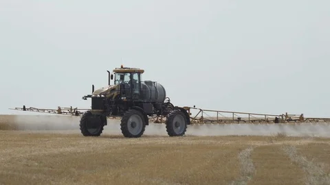 Tractor Irrigates Dry Land Stock Footage 111880351