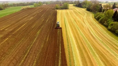 Tractor with Liquid Manure Spreader on field - Aerial view Stock Footage 62936452