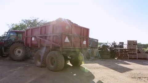 Tractor loaded with potatoes Stock Footage 82076794