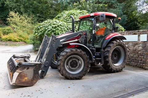 Tractor with loader bucket Stock Photos