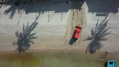 Tractor machine Cleaning a sand beach Stock Footage 134253782