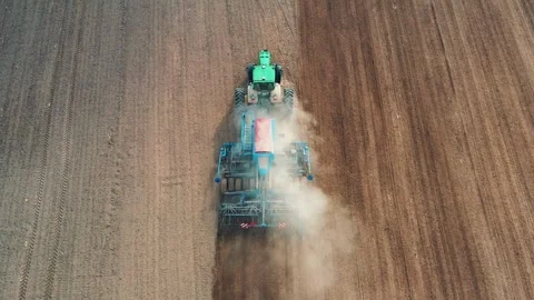 Tractor Machine Sow Cereals Or Corn Into Soil in Agricultural Field Aerial View Stockbeeldmateriaal 265100958
