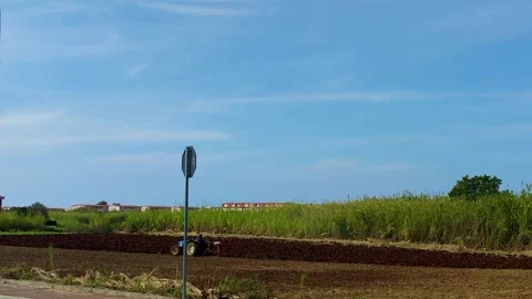 The Tractor Makes Fertilizer in the Field. Stock Footage 241936131
