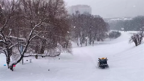 A tractor makes a ski track Video stock 329664018