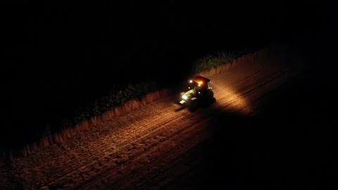 A tractor in the middle of the field at night. Night view of the tractor. Scane5 Video stock 158629861