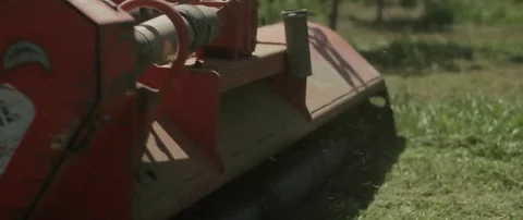 Tractor mowing grass in field Stock Footage 69201770